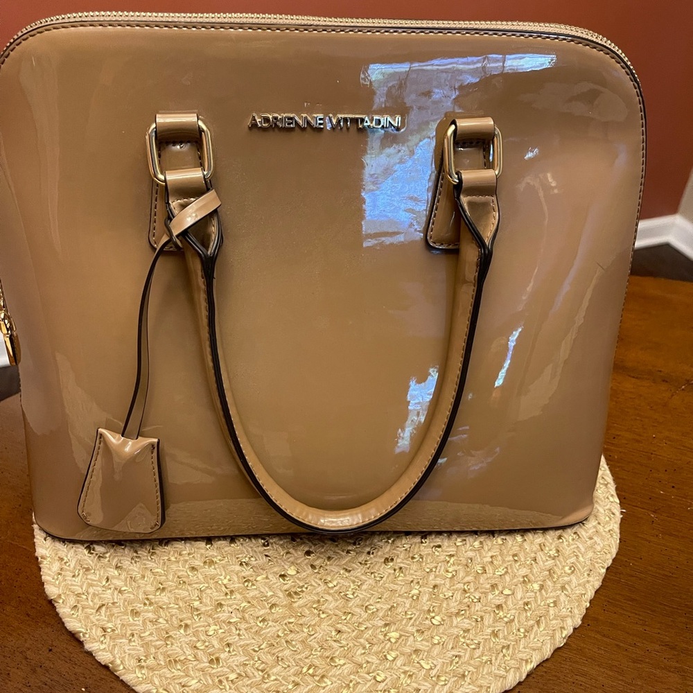 Beautiful nude patent leather Adrienne Vittaduni handbag.